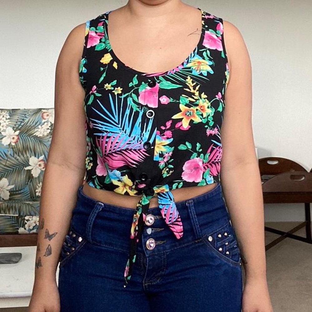 Forever  21 black sleeveless crop top with flowers.